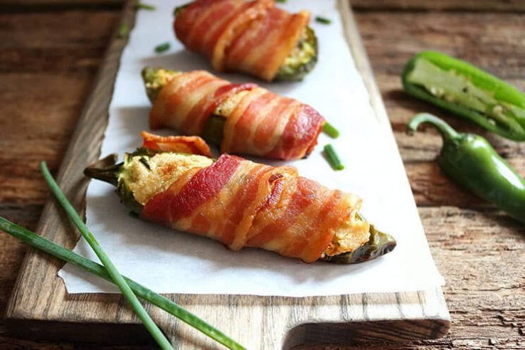 Bacon Wrapped Sweet Pepper Poppers are the perfect appetizer with sweet mini bell peppers stuffed with a cheesy herb filling wrapped in crispy bacon! Sweet Pepper Poppers | Bell Pepper Stuffed Poppers | Appetizers | Mini Bell Pepper Recipes | Bacon Recipes | Easy Entertaining Recipes