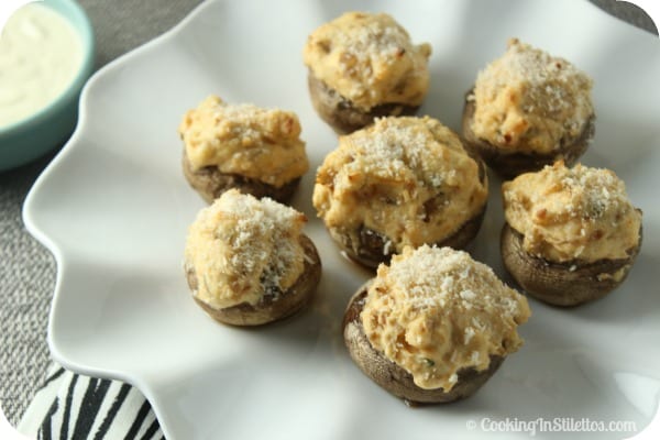 These Ultimate Stuffed 'Shrooms from CookingInStilettos.com are the best stuffed mushrooms, filled with a creamy cheesy filling and served with a creamy horseradish dipping sauce. A twist on the Houlihan's classic, these Ultimate Stuffed 'Shrooms are always a crowd pleaser!