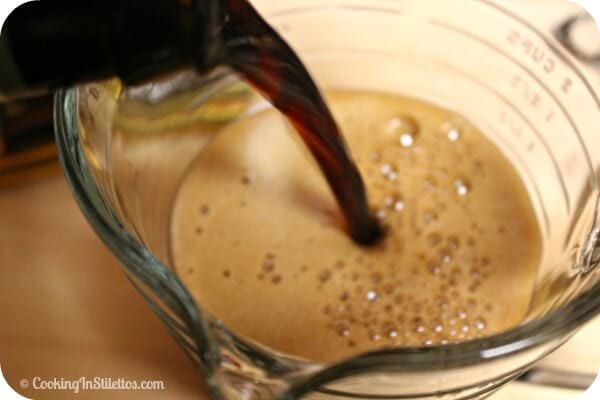 Chocolate Stout Bundt Cake - Pouring the Stout | Cooking In Stilettos