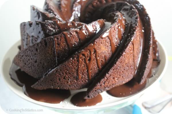 This Chocolate Stout Bundt Cake from CookingInStilettos.com is a showstopper. So easy to make and decadent, drizzled with a bit of extra chocolate - what's not to love? | @CookInStilettos