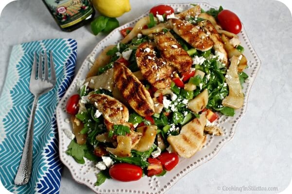 This Grilled Chicken and Pear Salad with Lemon Basil Vinaigrette from CookingInStilettos.com easily has the flavors of summer on a plate. Grilled chicken and juicy pears are accented by peppery arugula and salty ricotta salata and drizzled with a lemon basil vinaigrette. What's not to love!