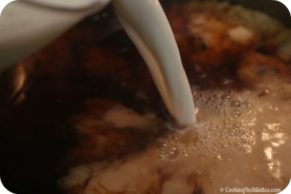 Bourbon Laced Vanilla Chai Latte - Adding a bit of Milk | CookingInStilettos.com