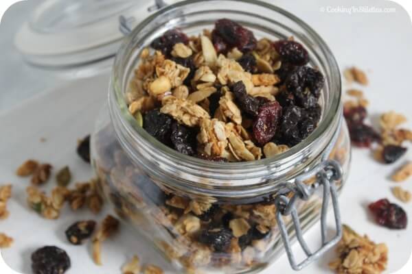 Cherry Almond Granola from CookingInStilettos.com is a fabulous way to start your day! Dried cherries and almonds are tossed with oats, spices and nuts for a fabulous sweet and crunchy bite. Homemade Granola | Healthy Snack | Dried Cherries | Almonds | Cranberries | Made From Scratch | Easy Recipe