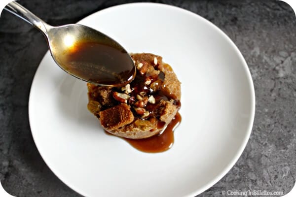 Mini Spiced Rum Raisin Bread Pudding - Drizzling on the Sauce | Cooking In Stilettos