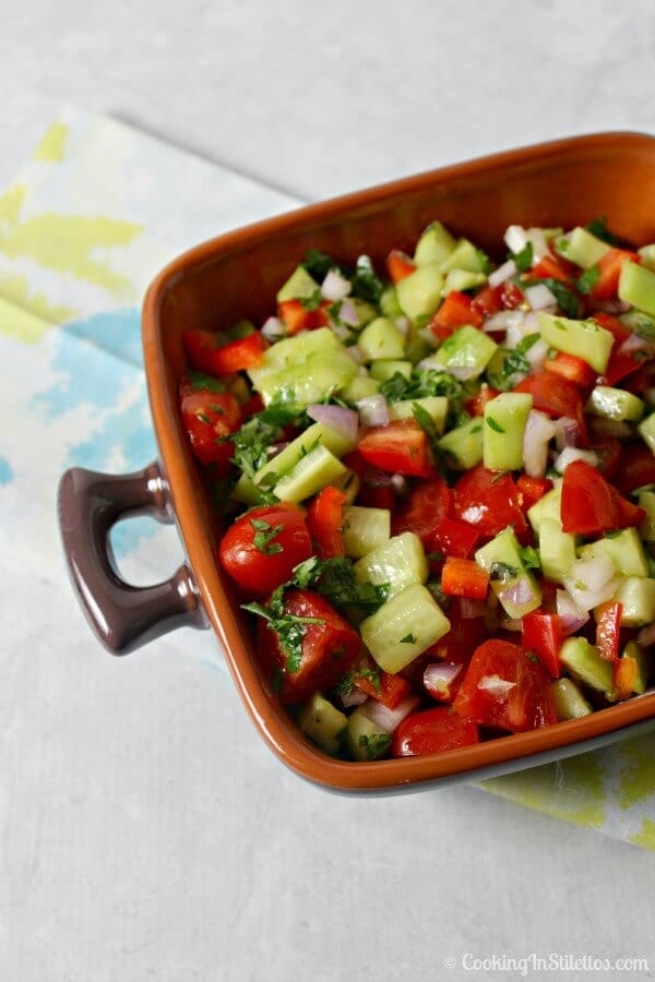 Nothing says summer better than fresh produce and this Fresh Cucumber Salad from CookingInStilettos.com with crisp veggies tossed in a lemony herb vinaigrette is perfect for summer entertaining. Added bonus - summer produce couldn't be fresher thanks to #OXOGreensaver. Vegetarian | Produce | Cucumber Salad | Fresh Summer Salad | Cookout | Picnic Recipes