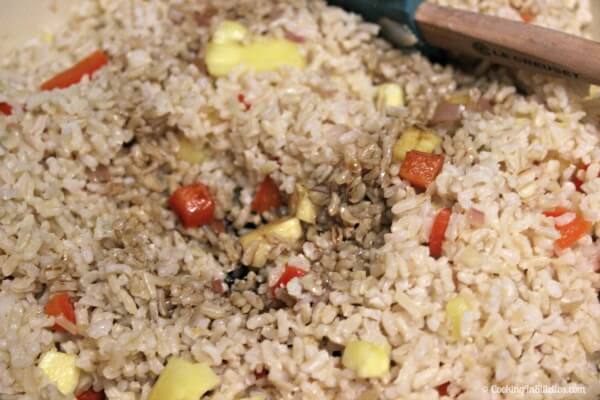 Aloha Fried Rice - Adding the Rice and a Drizzle of Soy | Cooking In Stilettos