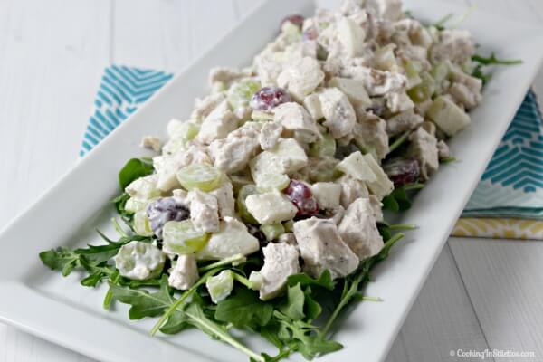 Chicken Waldorf Salad is a light modern twist on a classic. Fresh chicken is tossed with crisp celery, apples, grapes and crunchy walnuts and drizzled with a lemony yogurt dressing for the perfect picnic salad! Chicken Salad | Summer Salad | Yogurt | Healthy Salad | Salads made Lighter | Picnic Recipe | Summer Recipe 