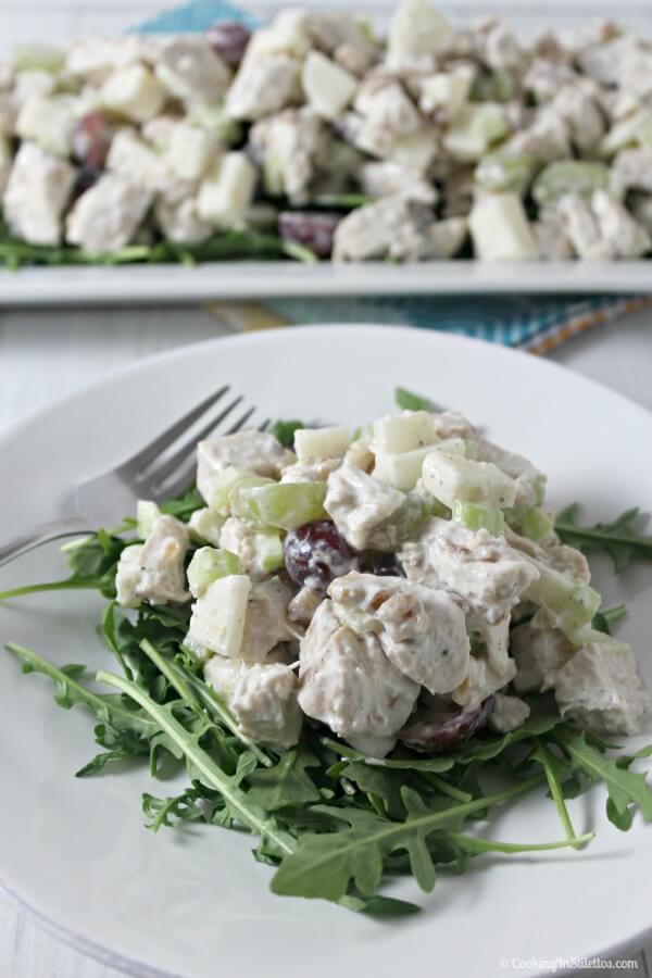 Chicken Waldorf Salad is a light modern twist on a classic. Fresh chicken is tossed with crisp celery, apples, grapes and crunchy walnuts and drizzled with a lemony yogurt dressing for the perfect picnic salad! Chicken Salad | Summer Salad | Yogurt | Healthy Salad | Salads made Lighter | Picnic Recipe | Summer Recipe 