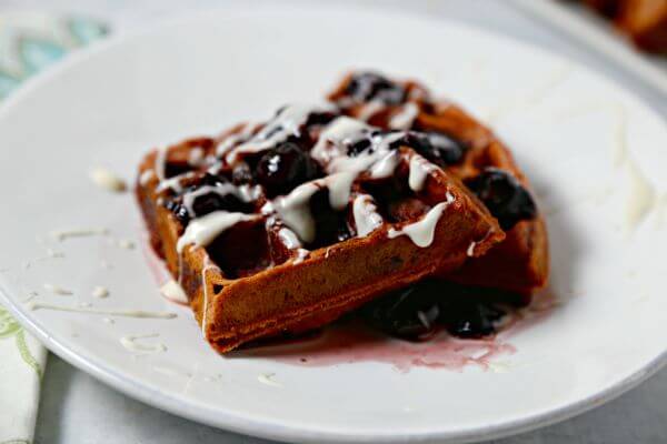 Red Velvet Waffles with Bourbon Cherry Syrup and Cream Cheese Drizzle | Cooking In Stilettos