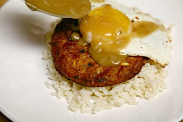 Meatless Loco Moco with Savory Onion Gravy - Assembling the Loco Moco | CookingInStilettos.com