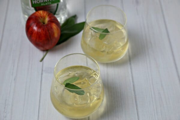 Toast the season with this autumn-inspired Tequila Cider Smash Cocktail from CookingInStilettos.com. Silver tequila, apple cider and fresh sage are muddled into the perfect sip! Tequila Cider Smash Cocktail | Tequila Cocktail Recipe | Apple Cider Cocktail | Fall Cocktail | Easy Cocktail Recipe | Muddled Cocktail 