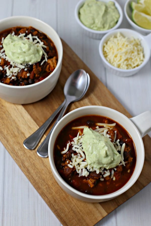 Baja Chicken Chili from CookingInStilettos.com is ready in 30 minutes and tastes like it has simmered for hours. Southwestern flavors, spices & a hint of honey unite for the perfect chicken chili recipe. | @CookInStilettos 