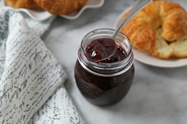 This Easiest Ever Strawberry Jam recipe from CookingInStilettos.com is perfect for brunch this weekend with just a few ingredients for a delicious fresh tasting strawberry jam! | Strawberry Jam | Refrigerator Jam | Freezer Jam | Strawberries | Made from Scratch 