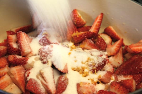 Easiest Ever Strawberry Jam - Adding a bit of Sugar | CookingInStilettos.com