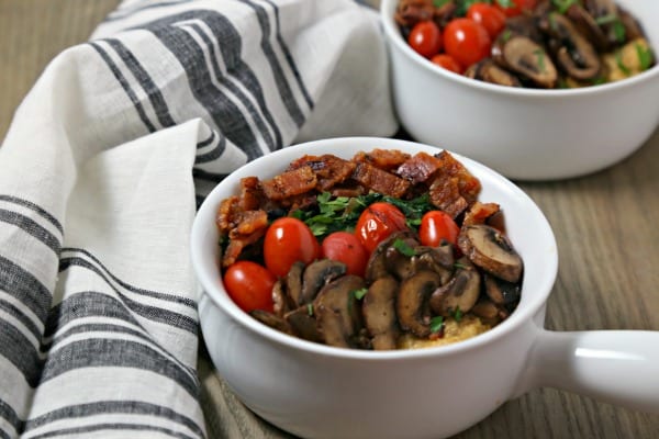 For your next brunch or when you want breakfast for dinner, make this Savory Oatmeal with Bacon, Spinach and Blistered Tomatoes from CookingInStilettos.com. This savory oatmeal recipe will be a chic and comforting favorite | @CookInStilettos