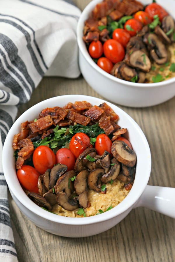 For your next brunch or when you want breakfast for dinner, make this Savory Oatmeal with Bacon, Spinach and Blistered Tomatoes from CookingInStilettos.com. This savory oatmeal recipe will be a chic and comforting favorite | @CookInStilettos