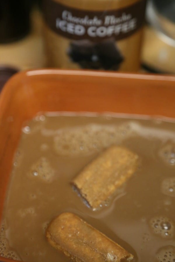 Chocolate Mocha Tiramisu Parfaits- Soaking the Ladyfinger Cookies | CookingInStilettos.com