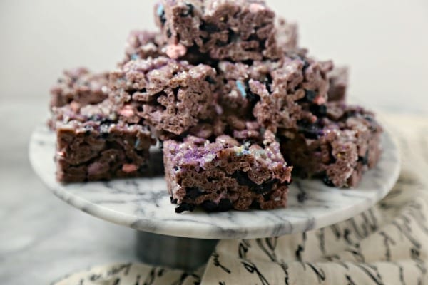 These whimsical Blueberry Studded Boo Berry Cereal Treats from CookingInStilettos are a fun twist on a classic sweet cereal bar recipe, studded with dried blueberries and drizzled with a vanilla glaze and sprinkled with a bit of sparkle! 