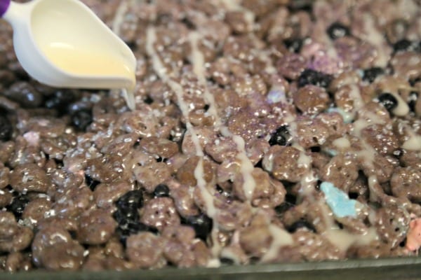 Blueberry Studded Boo Berry Cereal Treats - Drizzling the Glaze | CookingInStilettos.com