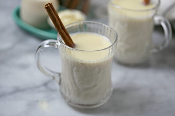 A steaming mug of this creamy Chila ‘Orchata White Hot Chocolate from CookingInStilettos.com is a delicious way to ring in the holidays with a bit of spirit! This easy homemade White Hot Chocolate comes together in minutes and has a touch of cinnamon and rum for the perfect warm sip to enjoy by the twinkling lights of the Christmas Tree or by a roaring fire on a snowy evening!