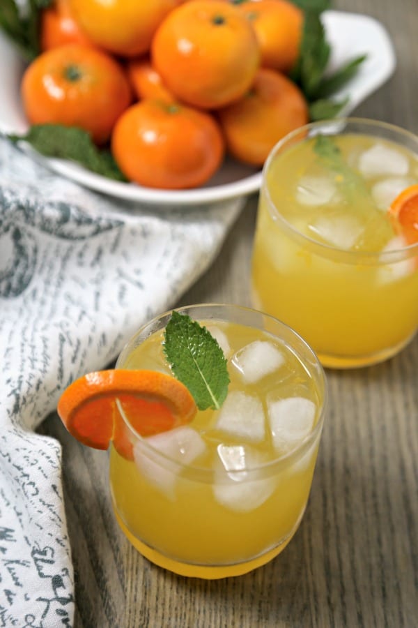 This Tangerine Mojito from CookingInStilettos.com is a citrusy twist on a classic mojito recipe. Fresh tangerine juice is muddled with rum, mint, and Tropicana Tangerine Lemonade for the perfect sunshine inspired cocktail, fabulous for last minute entertaining!