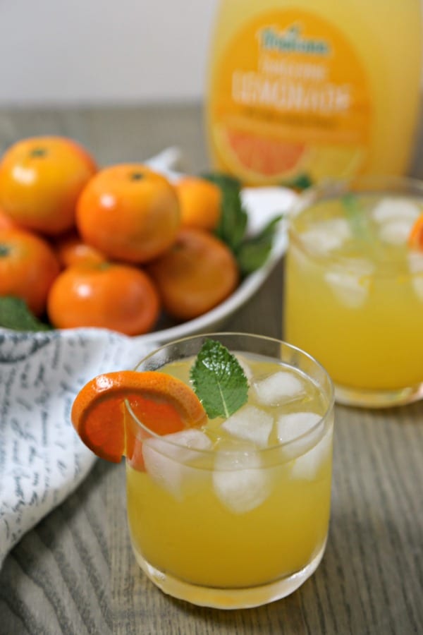 This Tangerine Mojito from CookingInStilettos.com is a citrusy twist on a classic mojito recipe. Fresh tangerine juice is muddled with rum, mint, and Tropicana Tangerine Lemonade for the perfect sunshine inspired cocktail, fabulous for last minute entertaining!