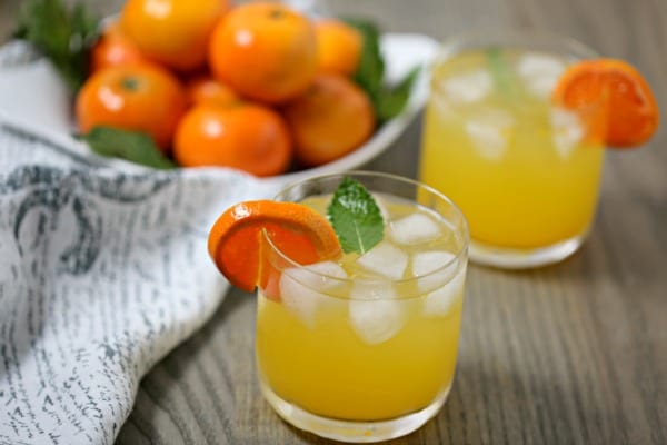 This Tangerine Mojito from CookingInStilettos.com is a citrusy twist on a classic mojito recipe. Fresh tangerine juice is muddled with rum, mint, and Tropicana Tangerine Lemonade for the perfect sunshine inspired cocktail, fabulous for last minute entertaining!