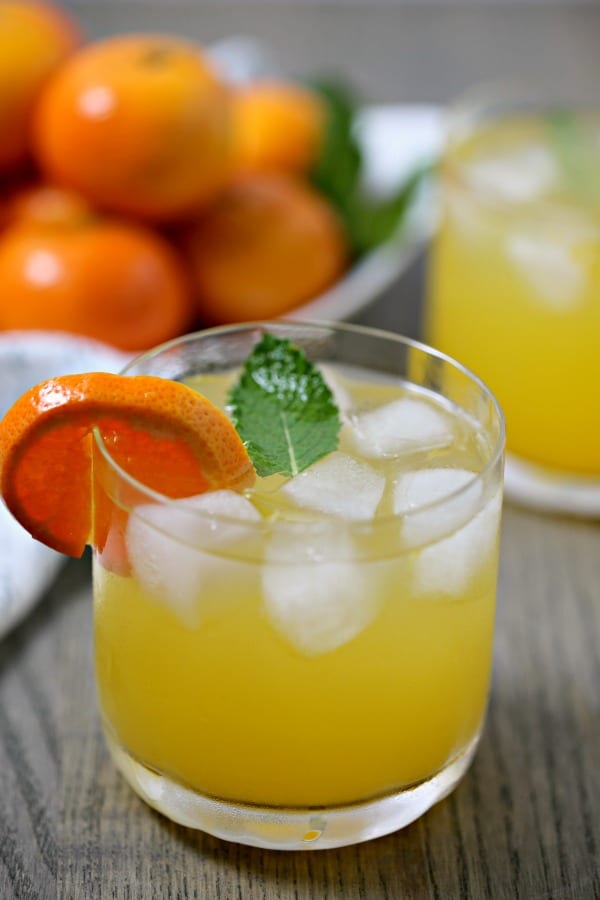 This Tangerine Mojito from CookingInStilettos.com is a citrusy twist on a classic mojito recipe. Fresh tangerine juice is muddled with rum, mint, and Tropicana Tangerine Lemonade for the perfect sunshine inspired cocktail, fabulous for last minute entertaining!