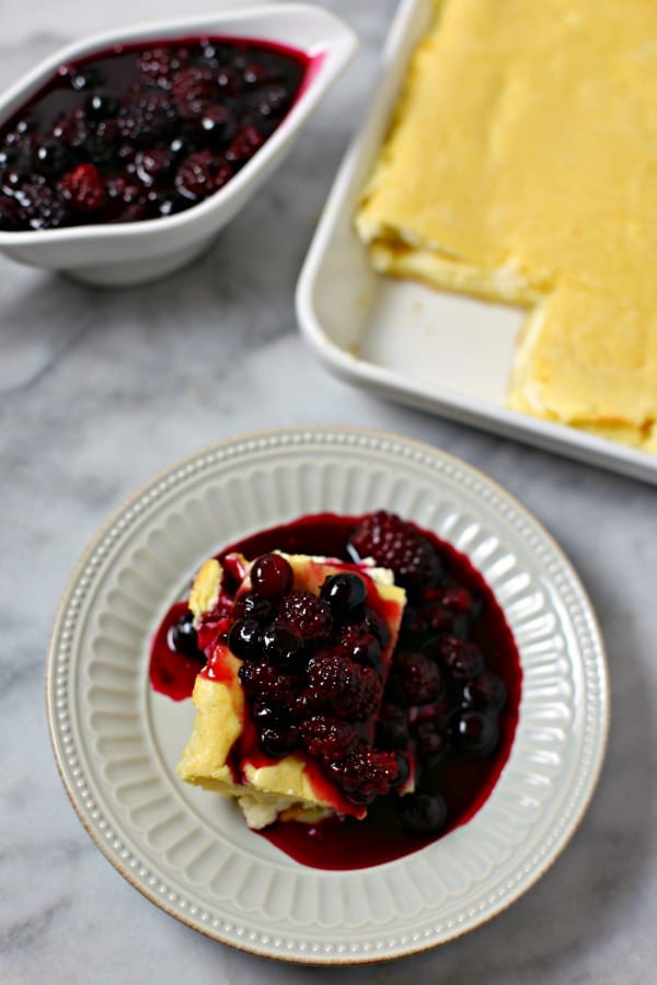 For your next weekend brunch, make these scrumptious Lemon Baked Blintzes with Summer Berry Compote - an easy sweet breakfast or brunch recipe! #BrunchWeek Make Ahead Recipe | Blueberry | Blackberries | Breakfast | Brunch