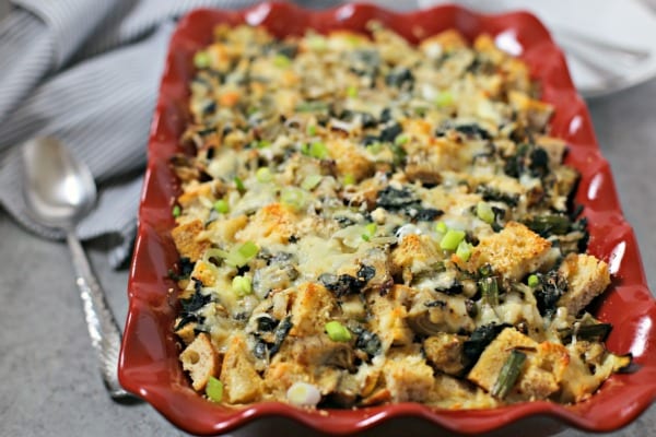 This Spinach Artichoke and Asparagus Strata from CookingInStilettos.com is packed with layers of flavor, fresh veggies and sharp cheddar cheese - a make-ahead dish perfect for brunch! #BrunchWeek Strata | Breakfast | Brunch | Casserole | Make Ahead Recipe