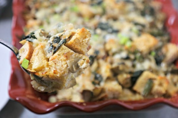 This Spinach Artichoke and Asparagus Strata from CookingInStilettos.com is packed with layers of flavor, fresh veggies and sharp cheddar cheese - a make-ahead dish perfect for brunch! #BrunchWeek Strata | Breakfast | Brunch | Casserole | Make Ahead Recipe